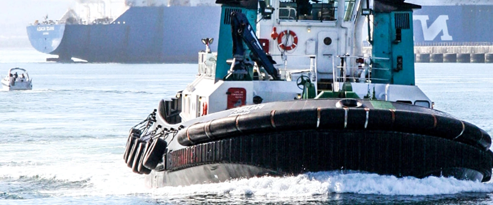 A tugboat sailing in the water